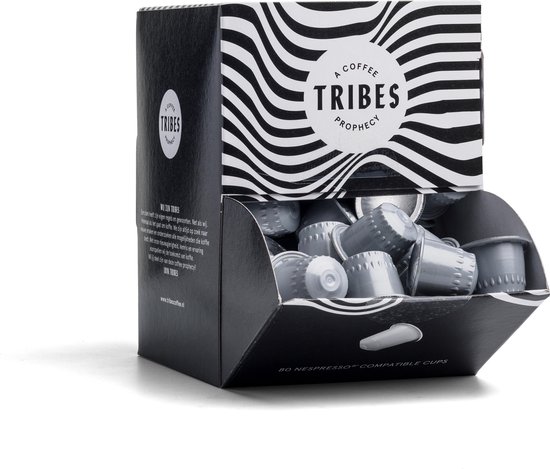 Zwarte en witte kartonnen doos met 'Tribes Coffee Prophecy' logo, gevuld met 80 zilverkleurige Nespresso cups.