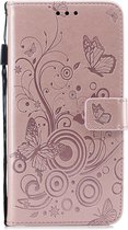 Apple iPhone X - iPhone XS Bookcase - Roze - Vlinders - Bloemen - Portemonnee Hoesje
