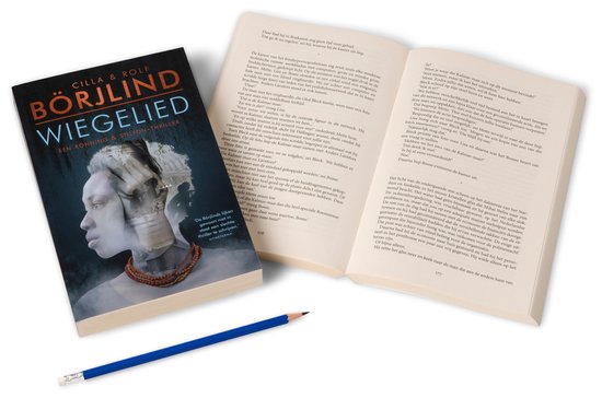 Open boek met op de linkerpagina de omslag van 'Wiegelied' en op de rechterpagina tekst.