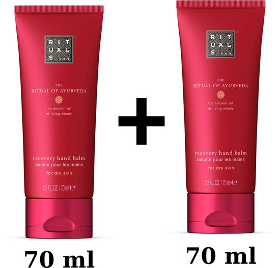 Twee rode tubes handcrème van Rituals, elk 70 ml, met de tekst 'recovery hand balm'.