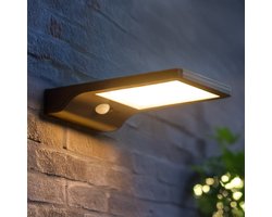 Solar wandlamp buiten 'Slim' - Zwart - Buitenlamp met sensor - Tuinverlichting met sensor - Schijnwerper met bewegingsmelder - Wandlamp op zonne-energie Solar wandlamp buiten 'Slim' - Zwart - Buitenlamp met sensor - Tuinverlichting met sensor - Schijnwerper met bewegingsmelder - Wandlamp op zonne-energie