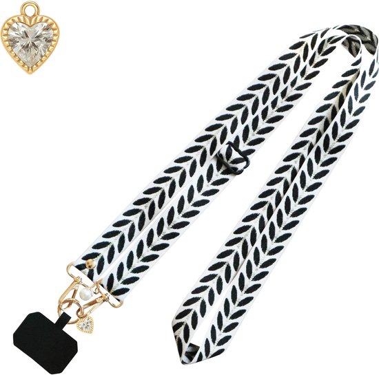 Lanière de téléphone noir et blanc avec motif de feuilles, clip doré, perle et breloque en forme de cœur.