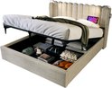 Eenpersoonsbed met opbergruimte, beige gestoffeerd hoofdbord met knopen, ingebouwde leeslampjes en USB-poort.