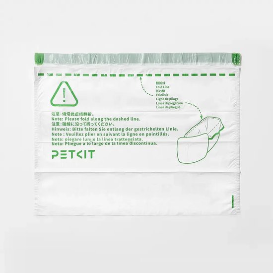 Witte en groene PETKIT vuilniszakken met vouwinstructies op de verpakking.