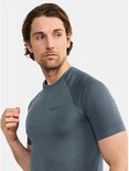 Grijze Craft sportshirt, met aquagrijs stiksel en Craft logo op de borst.
