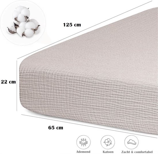 Crème ledikant hoeslaken van 125 cm lang, 65 cm breed en 22 cm hoog. Katoen.