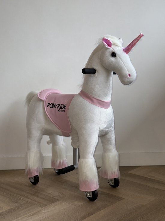 Foto: Ponyride rijdend speelgoed paard hobbelpaard eenhoorn unicorn 85x33x105 cm 4 10 jaar inclusief inline skate wieltjes en leder zitje regenboog