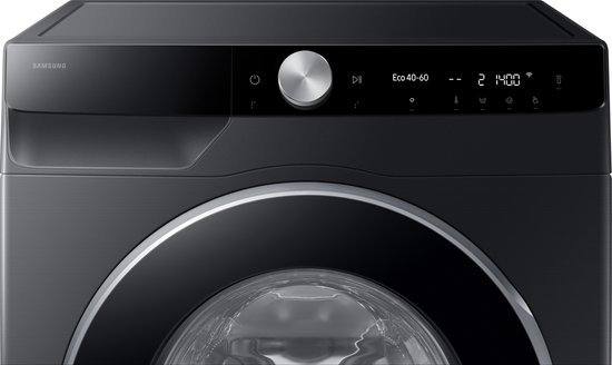 Close-up van het digitale bedieningspaneel en de draaiknop van een zwarte Samsung wasmachine.