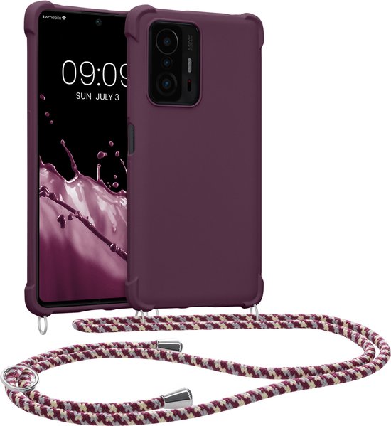 Étui de téléphone violet prune avec cordon, à côté d'un téléphone avec fond d'écran éclaboussures violettes.