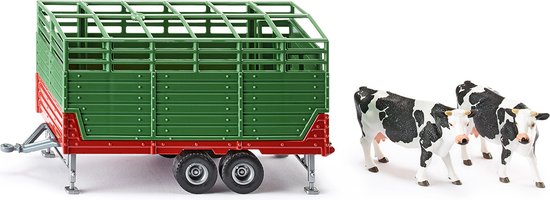Groene veewagen met rode bodem en twee zwart-witte koeien ernaast, op witte achtergrond.