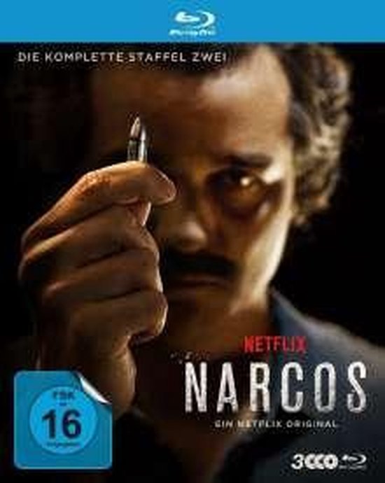 Blu-ray hoes van Narcos: Seizoen 2, met een man die een kogel vasthoudt. "DIE KOMPLETTE STAFFEL ZWEI" staat bovenaan.