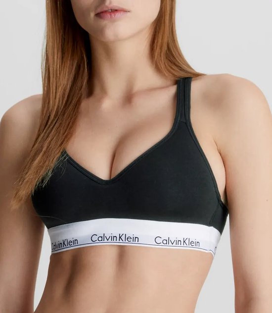 Zwarte Calvin Klein bralette met V-hals en witte tailleband met logo.