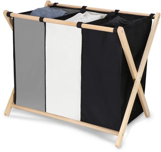 Drielaagse wasmand met houten frame, gevuld met kleding. De vakken zijn zwart, grijs en ecru.
