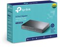 Verpakking van de TP-Link TL-SG1008P switch met specificaties en PoE-functies.