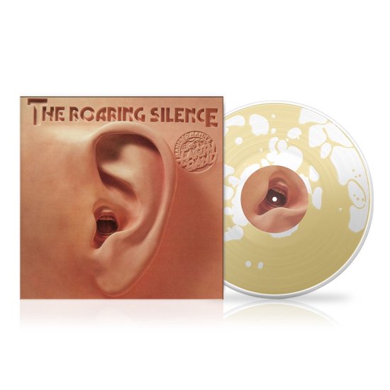 Vinyl lp The Roaring Silence met een oor op de hoes en een goudkleurige plaat met vlekpatroon en oor-label.