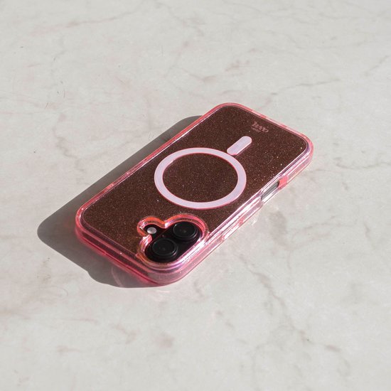 Roze telefoonhoesje met bruine glitters, magneetring en 'xoxo' logo.