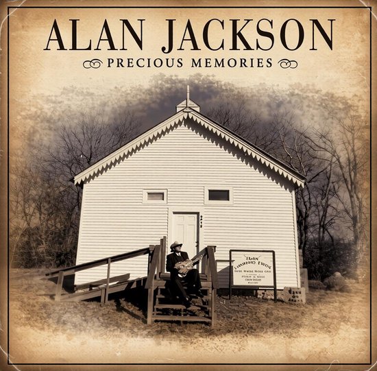 Alan Jackson - Precious Memories albumcover met een man met gitaar zittend op de trappen van een witte kerk.
