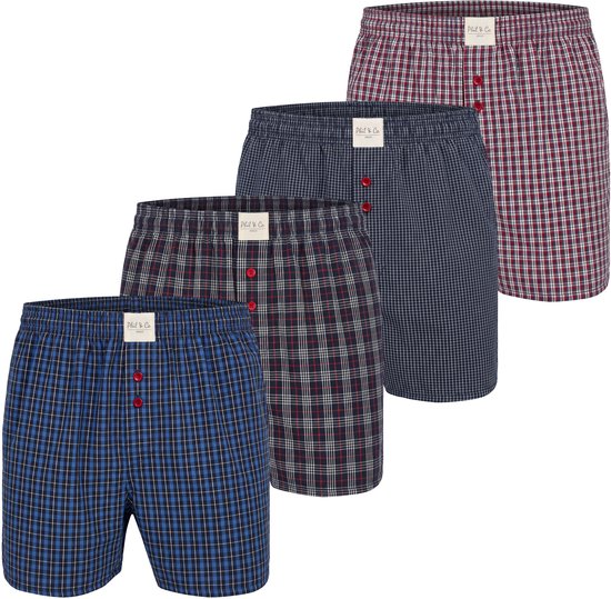 Vier boxershorts met ruitjes en strepen in blauw, donkerblauw en rood.