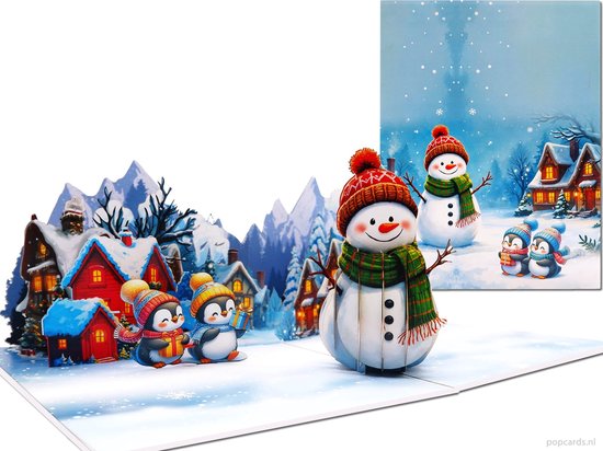 Kerstkaart met 3D-uitklapscène van een winterdorp met pinguïns en sneeuwpoppen in warme mutsen en sjaals.