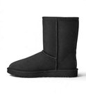 Zwarte UGG Classic Short II-laars van suède, zijaanzicht van de binnenkant.