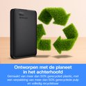 Zwarte WD Elements externe harde schijf naast een groen recycle-symbool van gras.