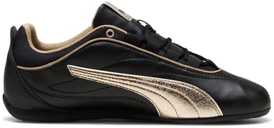 Zwarte Puma sneaker met gouden accenten, zoals de Puma-streep en voering.