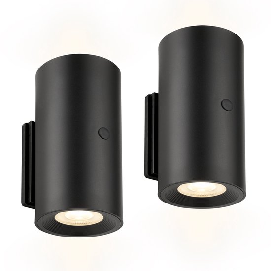 Twee zwarte Misy wandlampen met warm wit licht, naast elkaar op een witte achtergrond.