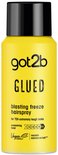 Gele spuitbus Got2b Glued Blasting Freeze Hairspray met zwarte dop.