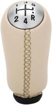 Beige pookknop met handgeschakelde versnellingsindicator (1-2-3-4-R) en zichtbare beige stiksels.