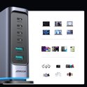 Grijze Joyroom multi-poort oplader met 4 USB-C en 2 USB-A poorten, toont compatibele apparaten: laptops, tablets, telefoons, drone, camera, gamecontrollers, earbuds, smartwatch.