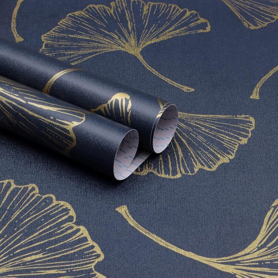 Twee rollen donkerblauw behang met gouden ginkgo bladeren.