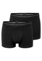 Twee zwarte Schiesser boxershorts naast elkaar, met merknaam op de elastische band.