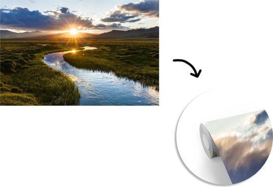 Behang - Fotobehang Zonsondergang boven een kalme rivier - Breedte 600 cm x hoogte 400 cm