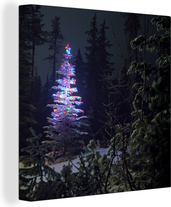 Canvas Schilderij Verlichte kerstboom in een donker bos - 20x20 cm - Wanddecoratie