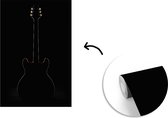 Behang - Fotobehang Een elektrische gitaar verdwijnt in de achtergrond - Breedte 150 cm x hoogte 220 cm