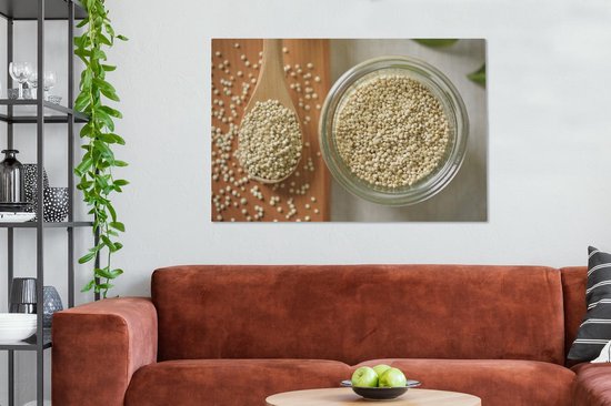 Canvas schilderij 120x80 cm - Wanddecoratie Quinoa in een glazen kom en op een houten lepel - Muurdecoratie woonkamer - Slaapkamer decoratie - Kamer accessoires - Schilderijen op canvas