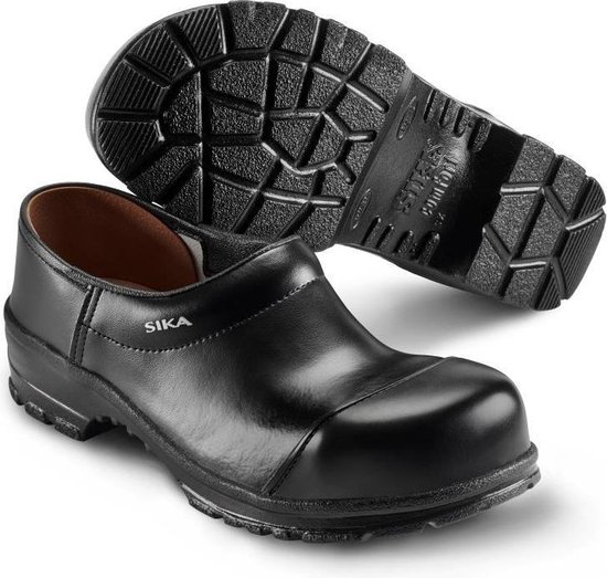 Een paar zwarte werkschoenen, één op de zijkant, de ander op de zool.