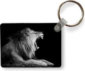 Porte-clés - Lion - Animaux sauvages - Herbe - Zwart - Wit - Distribution cadeaux - Plastique