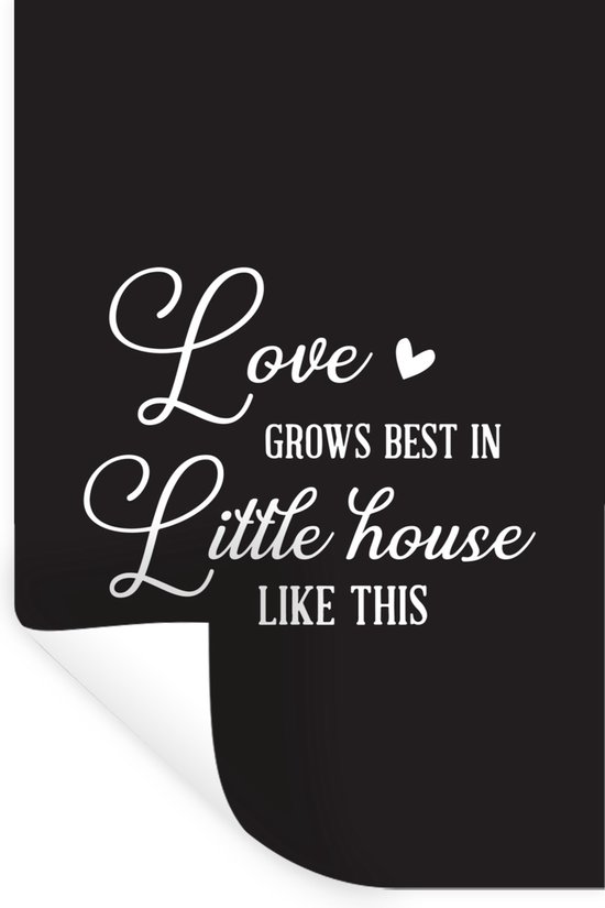 Sticker mural noir avec texte blanc : 'Love grows best in little house like this'. Avec un coin roulé en bas.