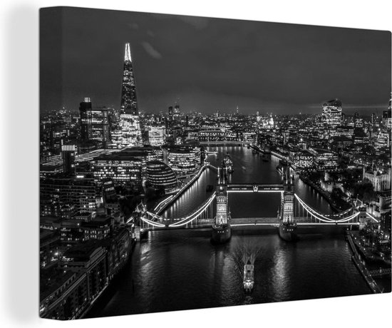 Canvas Schilderij De Tower Bridge verlicht in de nacht in Engeland - zwart wit - 120x80 cm - Wanddecoratie
