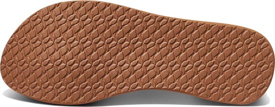 Onderkant van een cognacbruine Reef slipper met een visgraatprofiel.