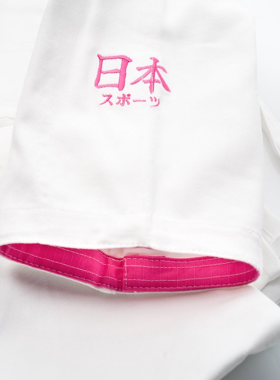 Judopak Nihon Meiyo Lady Gi | wit-roze | OP=OP (Maat: 140) - Nihon