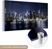 MuchoWow® Glasschilderij 80x40 cm - Schilderij acrylglas - New York - Licht - Skyline - Foto op glas - Schilderijen