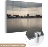 MuchoWow® Glasschilderij 60x40 cm - Schilderij acrylglas - Skyline - Haarlem - Water - Foto op glas - Schilderijen