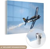 MuchoWow® Glasschilderij 150x100 cm - Schilderij acrylglas - Vliegtuig - Lucht - Rook - Foto op glas - Schilderijen