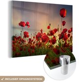 MuchoWow® Glasschilderij 120x80 cm - Schilderij acrylglas - Kleurrijke lucht boven een veld Klaprozen in Denemarken - Foto op glas - Schilderijen
