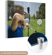 MuchoWow® Glasschilderij 40x30 cm - Schilderij acrylglas - Boogschieten - Outdoor - Sport - Foto op glas - Schilderijen
