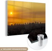 MuchoWow® Glasschilderij 90x60 cm - Schilderij acrylglas - Gele zonsondergang in Manila - Foto op glas - Schilderijen