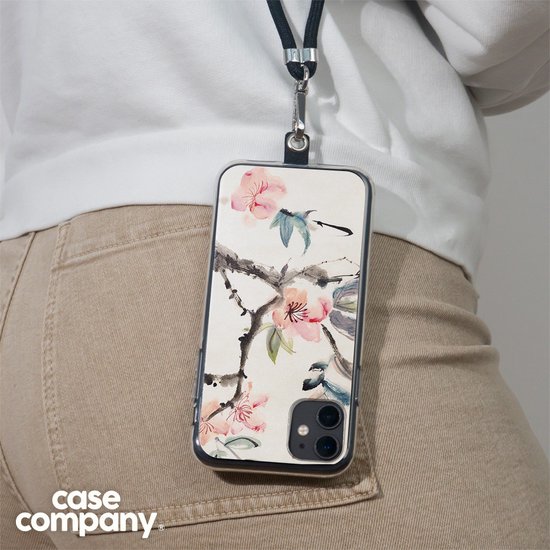 Imprimé aquarelle détaillé de fleurs de cerisier roses et d'un oiseau sur une coque de téléphone, portée en bandoulière.
