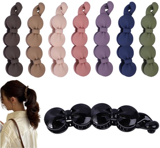 Set van 8 matte haarclips in de kleuren donkerbruin, beige, lichtroze, roze, paars, donkerblauw en groen. Zwarte glanzende clip onderaan.